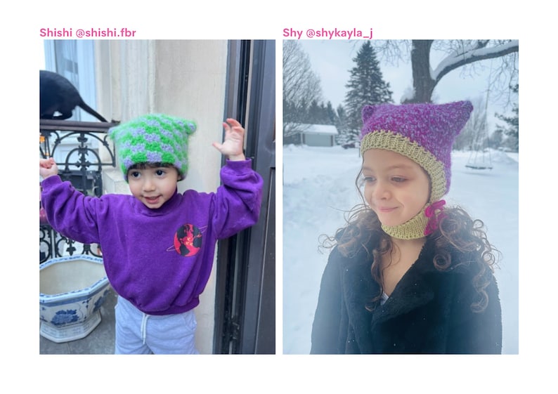 May include: Two children wearing handmade cat ear hats. One hat is green and purple, the other is purple and green. The child on the left is wearing a purple sweatshirt with a graphic. The child on the right is wearing a black coat.