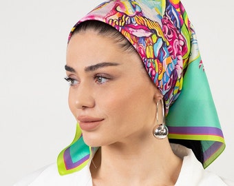 De Power On-sjaal van puur zijde laat de verfijnde schoonheid van een moderne vierkante hoofddoek zien