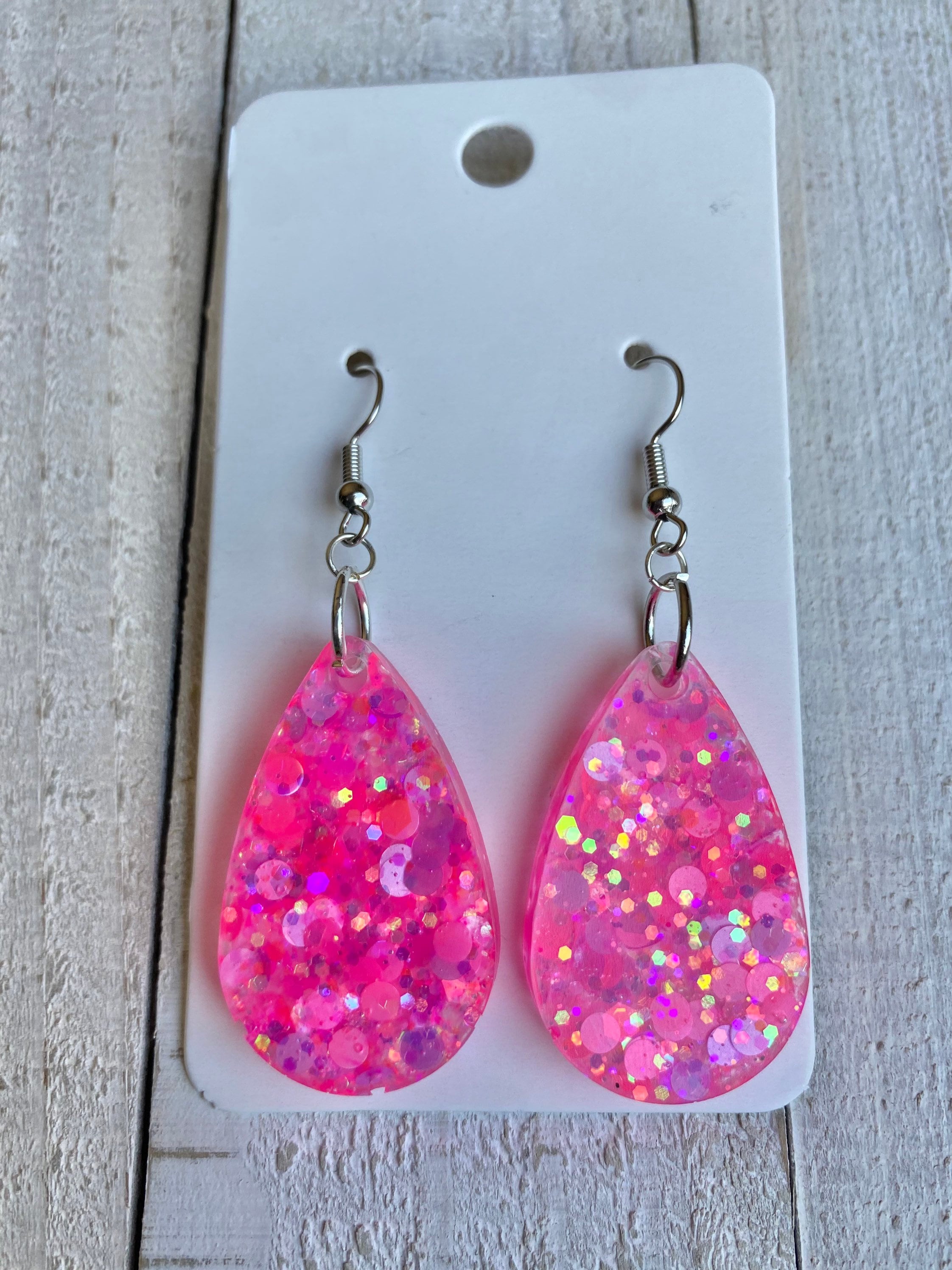 Neon pink and purple teardrop dangle earrings