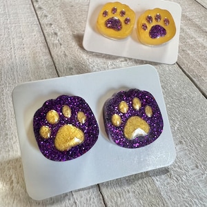 Purple and gold tiger paw stud earrings