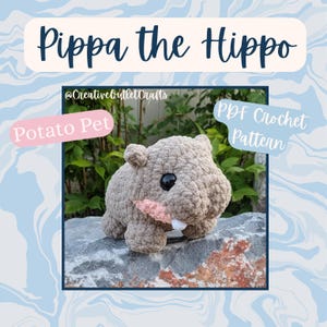 Pode incluir: Um brinquedo de hipopótamo de crochê em tons de cinza, com boca rosa e um único dente branco. O texto "Pippa the Hippo", "Potato Pet" e "PDF Crochet Pattern" é visível na imagem.
