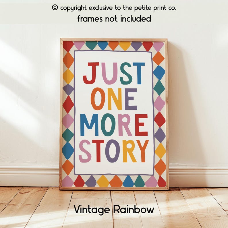 May include: A rectangular wall art print featuring the text "JUST ONE MORE STORY" in multicoloured block letters. The print is surrounded by a border of colourful diamond shapes in red, orange, yellow, blue, purple, and teal. The text "copyright exclusive to the petite print co. frames not included" and "Vintage Rainbow" are visible.