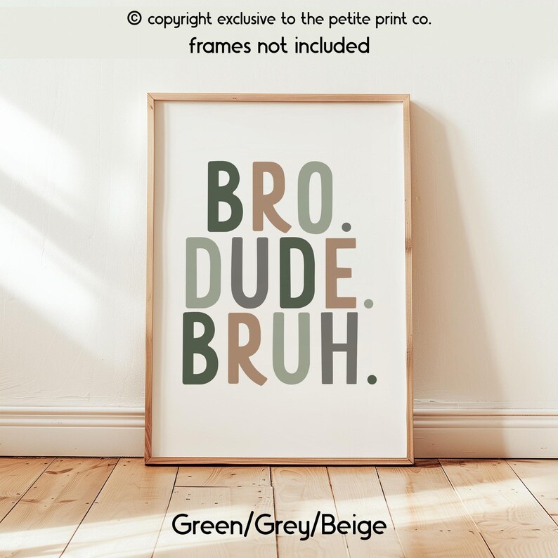 May include: Framed wall art with the words "BRO. DUDE. BRUH." in green, grey, and beige. The text is centered on a white background. The frame is a light brown color. The text "Green/Grey/Beige" is at the bottom.