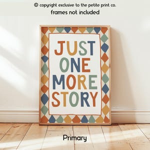 May include: A rectangular wall art print featuring the text JUST ONE MORE STORY in alternating orange, blue, and green letters. The design is enclosed by a border of repeating orange, blue, and green diamond shapes on a white background.
