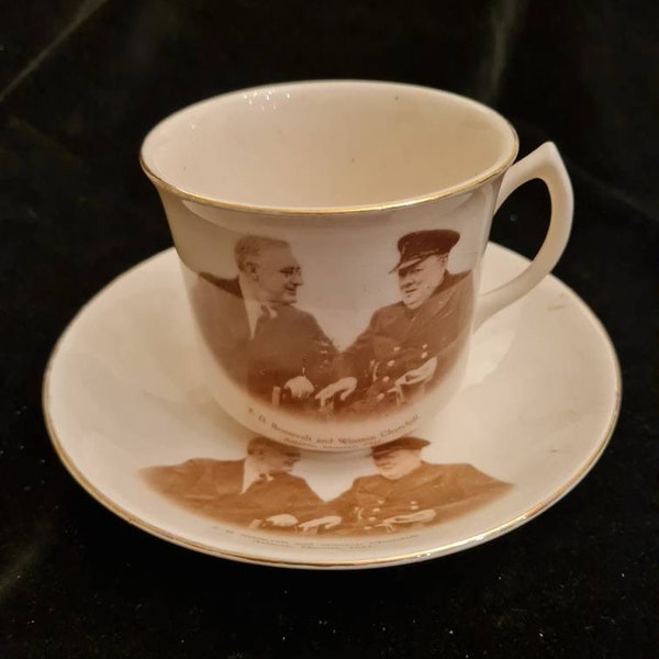 A Cup & Saucer by Lancaster depicting Winston Churchill and Presedent Roosevelt in 1941 (A371)