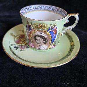 Pretty Aynsley Cup & Saucer for 1953 (A623)
