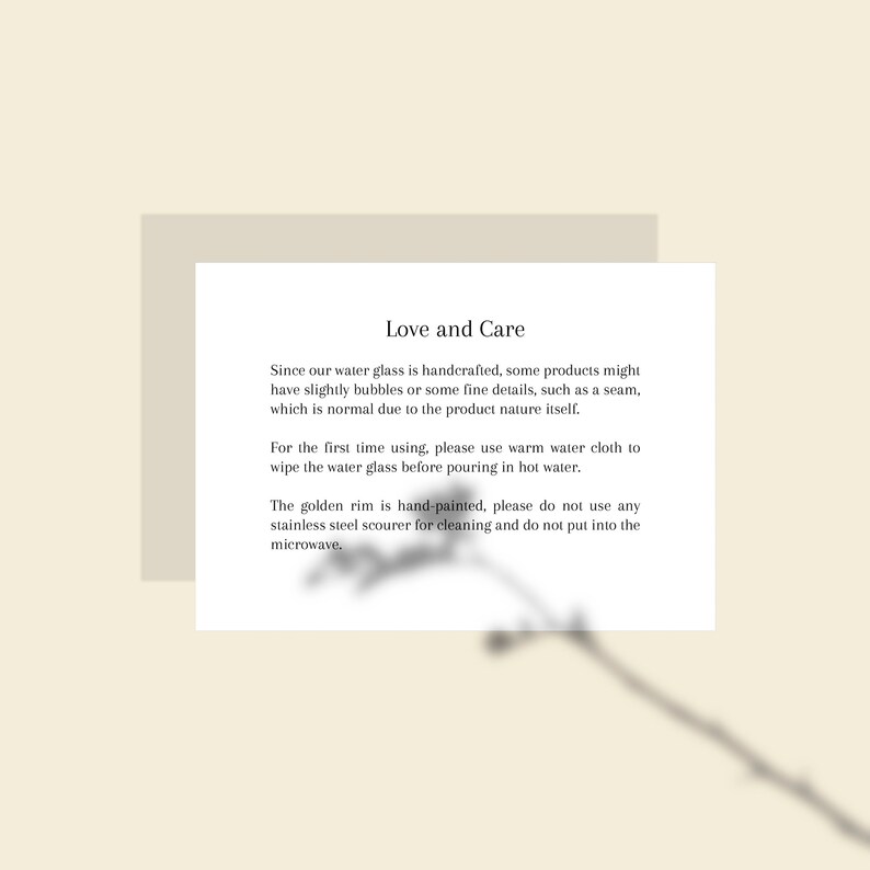 May include: A cream-colored card with the text "Love and Care" and care instructions for a water glass. The text describes the handcrafted nature of the glass and provides cleaning instructions.