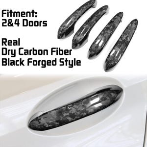 May include: Four black carbon fibre car door handles with a black forged style. The text "Fitment: 2&4 Doors" and "Real Dry Carbon Fibre Black Forged Style" is visible in the image.