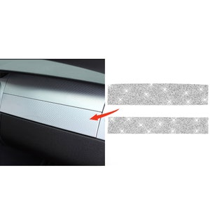 May include: Two silver glitter strips for car interior trim. The strips are shown next to a silver car dashboard trim piece.