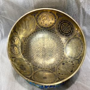 15 inches to 24 inches standing feet therapy Premium Large Singing Bowl-Adorned with standing feet including Dragon at the back of the bowl-