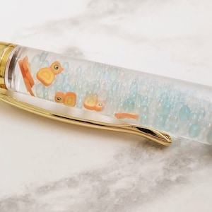 Rubber duckies  bubble bath float pen