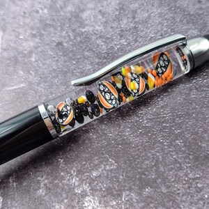 Spooky sweater float pen