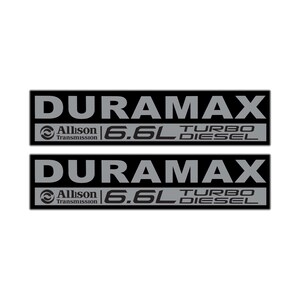 May include: Two black rectangular decals with the word "DURAMAX" in large, gray capital letters. Below, the text "Allison Transmission" and "6.6L TURBO DIESEL" are also displayed in gray.