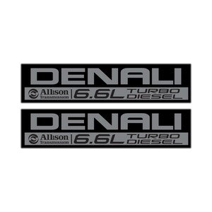 May include: Two black rectangular Denali emblems with gray text. Each emblem has the word "DENALI" at the top, "Allison Transmission" and a logo, and "6.6L TURBO DIESEL" at the bottom. The emblems are for a vehicle.