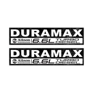 May include: Two black and white DURAMAX decals. Each decal has the word DURAMAX in large white letters, with the Allison Transmission logo and "6.6L TURBO DIESEL" text below. The background of the decals has a topographic map design.