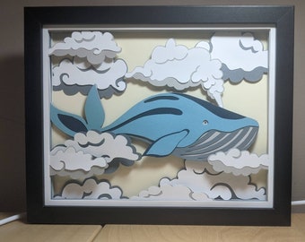 Cómo se hacen las nubes: arte en papel en capas de fantasía de ballena voladora