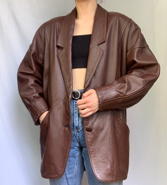 Brown leather jacket from 70’s with shoulder pads