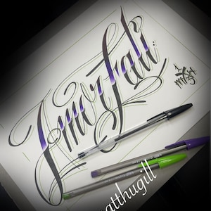 May include: Calligraphy artwork with the words "Amor Fati" in a stylized script, using purple and black ink. Three pens are visible: one black, one purple, and one green. The artist's handle, @matthugill, is also displayed.