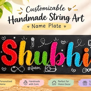 May include: A rectangular black name plate featuring the name Shubhi in colorful string art. Each letter is crafted with vibrant thread, including red, yellow, green, pink, blue, and orange. The board includes white hand-drawn icons and text.