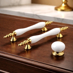 Tirador de porcelana blanca para armario, pomos dorados para tocador y armario.