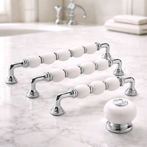 Witte porseleinen ladegrepen, zilveren kastgrepen, eenvoudig schoon te maken meubelknoppen