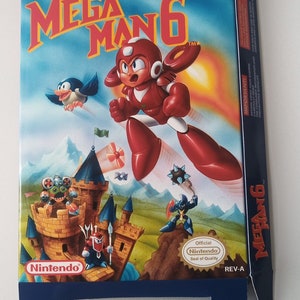 May include: A blue and white Nintendo Entertainment System game cartridge box for Mega Man 6. The box features a red robot character flying in the air with a blue bird and a castle in the background. The text "Mega Man 6" is printed in red and white on the box.