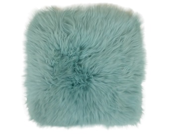 Dutchskins Schapenvacht stoelkussen turquoise vk - zitkussen schapenvacht - zetel kussen - sheepskin chair pad turquoise - blue seat pad