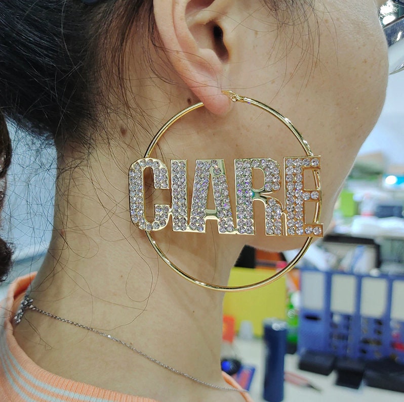 Nike swoosh discount earrings gold Nike swoosh discount earrings gold
