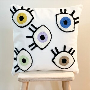 Colorful Evil Eye Punch Pillow – Handmade Embroidered Cushion – Boho Nazar Decor – Vibrant Home Accent – Unique Gift Idea