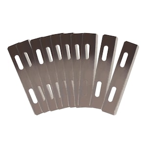 May include: A pack of 10 silver-coloured razor blades with a small hole in the centre of each blade.