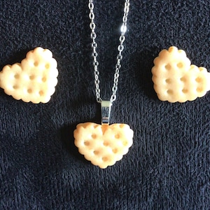 Knallerkette oder Ohrringe (14.100)
