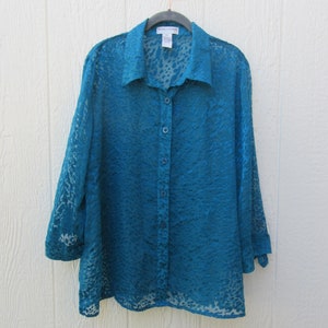 May include: A rustic wooden sign with the text "Welcome to our home" in white lettering. The sign features a distressed finish and a simple, inviting design, perfect for entryway decor.