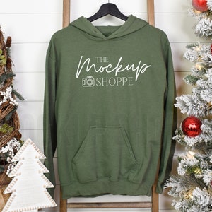 Gildan 18500 mockup Military Green, hanging Christmas hoodie mockup, 18500 Gildan heavy blend, lifestyle mockup, 18500 sweatshirt mock-up