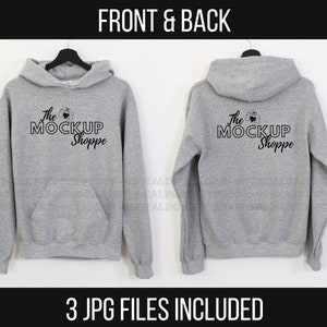 May include: A gray hooded sweatshirt mockup with the text "The Mockup Shoppe" and a camera icon printed on the front and back.
