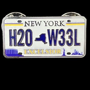 May include: A set of three ceramic canisters with lids, featuring a speckled white glaze and a minimalist design. The canisters vary in size, suitable for kitchen storage. The largest canister measures approximately 8 inches in height.