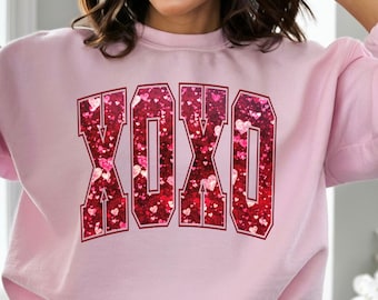 バレンタインデー スウェットシャツ：フェイクスパンコール XOXO ハート セーター