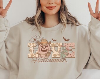 Western Halloween-sweater: retro pompoencowboy