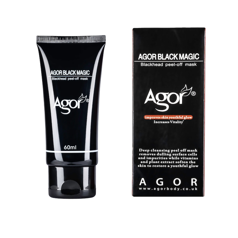May include: Black tube of Agor Black Magic blackhead peel-off mask with a 60ml label. The packaging is black with white text. The product is next to a black and white box with the same product name and description. The box says "improves skin youthful glow" and "Increases Vitality".