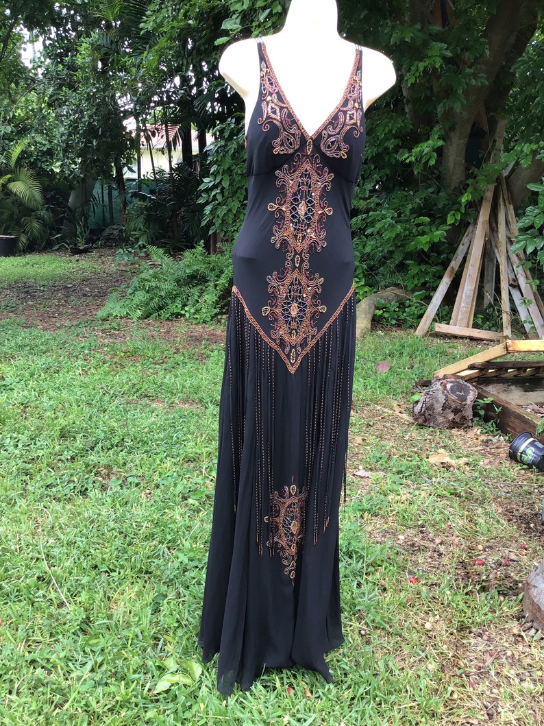 off the shoulder black and gold dress