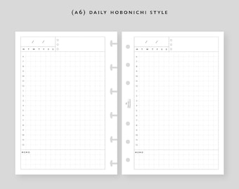May include: A6 daily planner with a grid layout and a memo section. The planner has a black and white design with the text "(A6) DAILY HOBONICHI STYLE" at the top.