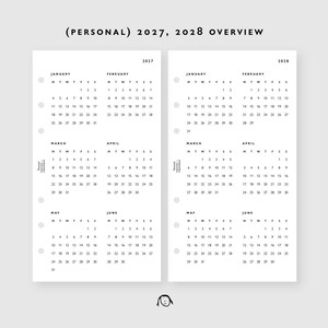 May include: Two white planner inserts featuring a 2027 and 2028 calendar overview. Each page displays six months with days of the week and dates in black text. The left side of each page has a vertical column of circular punch holes for binding.