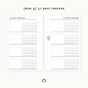 May include: A white planner insert with the text "(MINI 5) 31 DAYS TRACKER" at the top. The insert features a grid layout for tracking daily activities, with numbered boxes for each day of the month. The design is minimalist and functional.