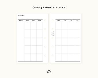 May include: A black and white printable monthly planner for a mini 5 size planner. The planner has a section for notes, days of the week, and a month label.