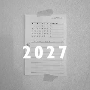 May include: A white rectangular paper calendar page for January 2026 with black text and lines. The layout includes a monthly grid, a priorities list with circular checkboxes, and a section for important events. The large white text 2027 is overlaid.