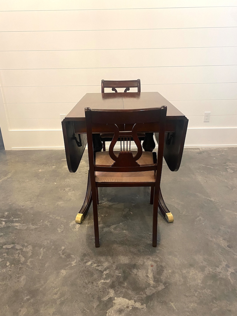 Mahogany Duncan Phyfe Dining Room Set. Six Chairs and Drop Leaf Table