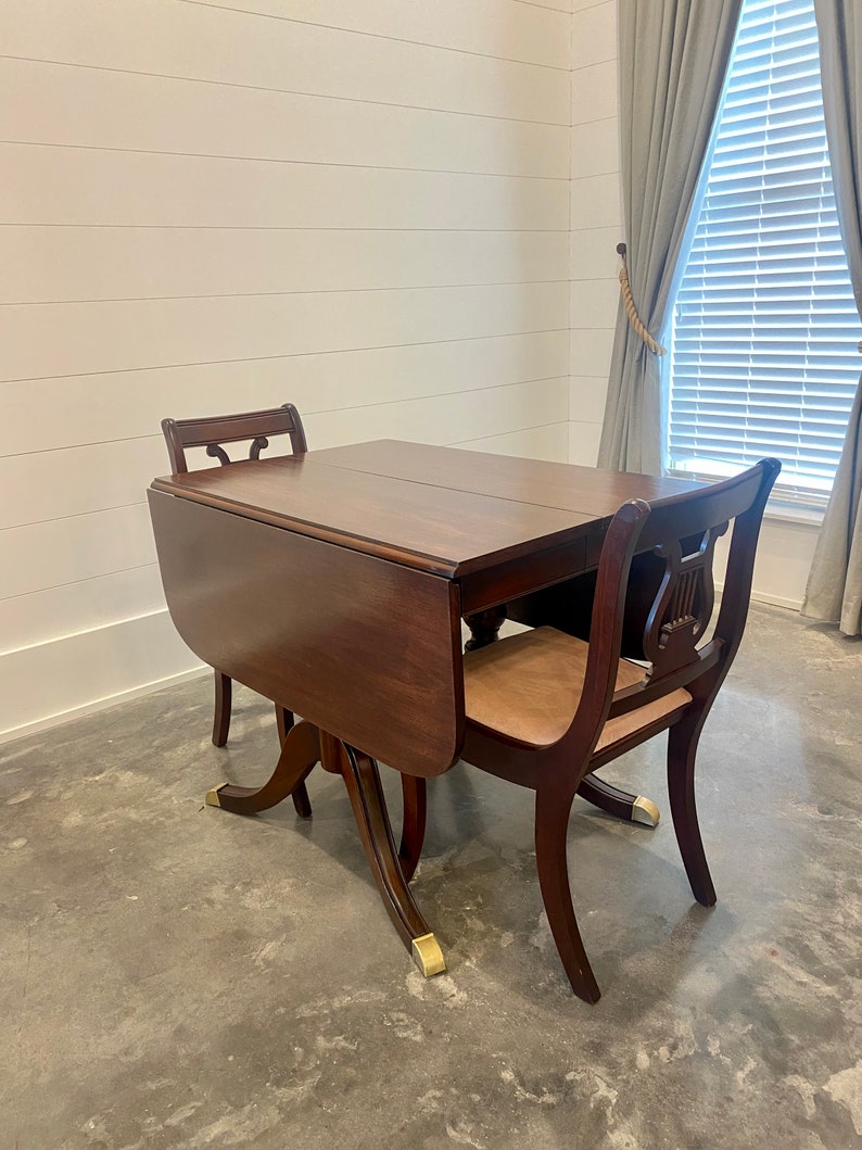 Mahogany Duncan Phyfe Dining Room Set. Six Chairs and Drop Leaf Table