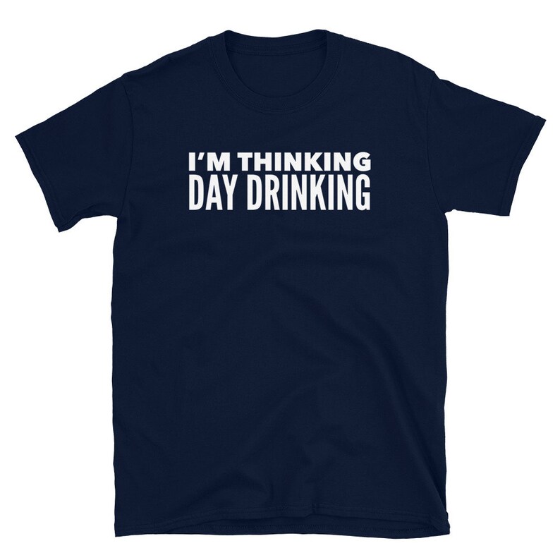 May include: A navy blue t-shirt with white text that reads "I'm thinking day drinking".