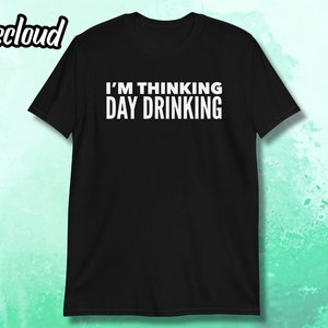 May include: Black t-shirt with white text that reads "I'm thinking day drinking."
