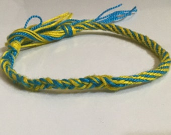 Yellow and Turquoise friendship bracelet that extends to any size