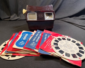 Stary, 1955-calowy View Master 3D Viewer z 13 slajdami, niektóre z książkami i koszulkami Disney